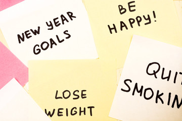 Popular new year goals or resolutions on colorful sticky blank n