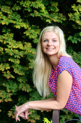 Young blond woman smiling