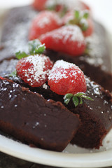 Closeup view of chocolate loaf cake with berries