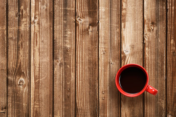 Coffee cup top view on wooden table