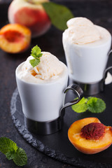 Peach  ice cream with mint, selective focus