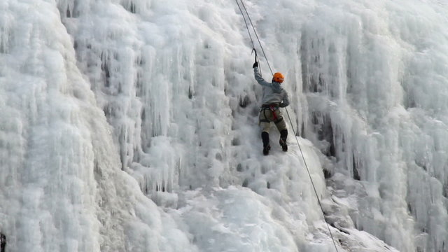 Ice climber man on mountain side P HD 8921