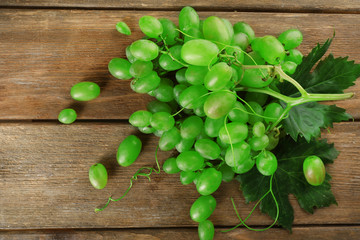 Bunch of white grape on wooden  background