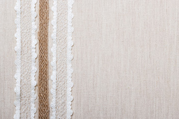 Lace frame on linen cloth background