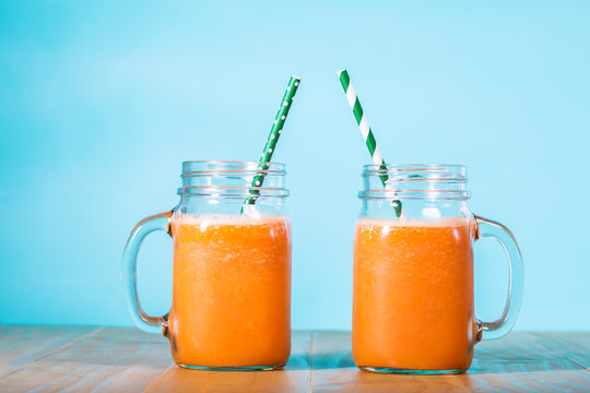 Carrot juice in masons jars