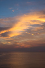 red and orange sunset evening cloud and sea wave background