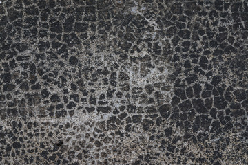 Texture of cracked stone wall background