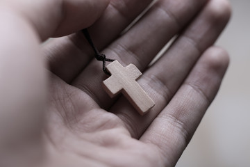 Hand Holding The Cross