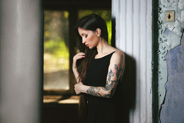 Young woman near the window