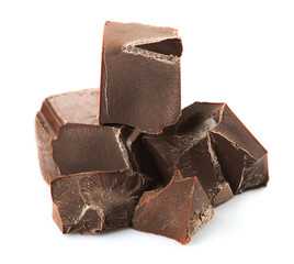 Milk chocolate pieces isolated on white