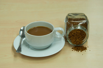 a cup of coffee and powder coffee