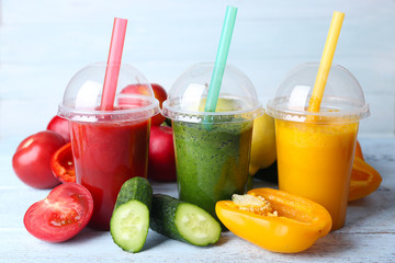 Fresh juice mix fruit, healthy drinks on color wooden background