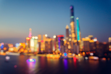 Panorama view of Shanghai city at night time. Bokeh blur.