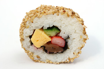 sesami sushi roll in the white