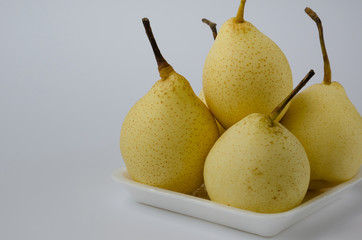 Fresh Chinese Pear In White Dish.