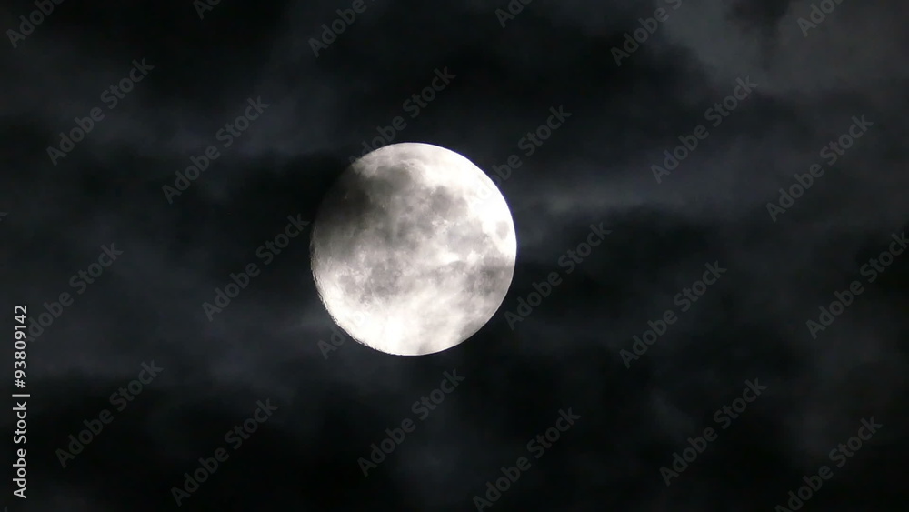 Canvas Prints full moon moving between clouds