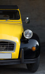 Fototapeta na wymiar Part of old retro yellow car.
