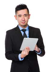 Young Businessman use of the tablet pc