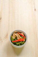 Spicy stir fried pork with red curry paste and Yard Long bean, T