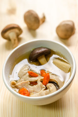 Close up Traditional oriental pork broth with shiitake mushrooms