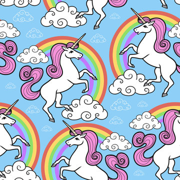 Cartoon vector seamless pattern. Unicorn with rainbow and clouds. For designed print.