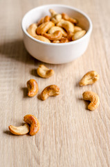 cashew nuts on wooden background