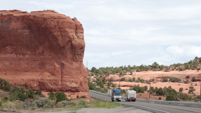 Canyonland desert road with traffic Moab Utah P HD 1719