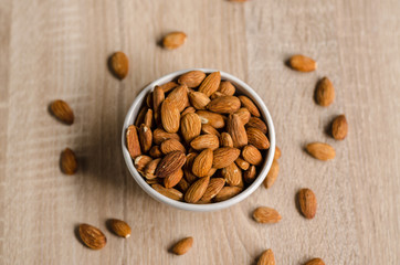 Almond Nuts on wooden background