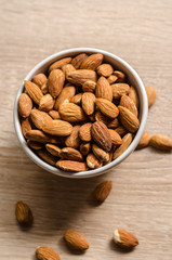 Almond Nuts on wooden background