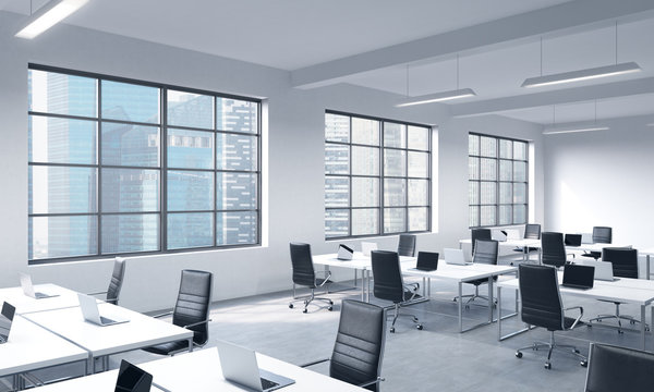 Corporate workplaces equipped by modern laptops in a modern panoramic office with Singapore view. Black leather chairs and white tables. 3D rendering.