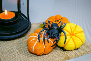 Three small pumpkins handmade with spider for Halloween decor