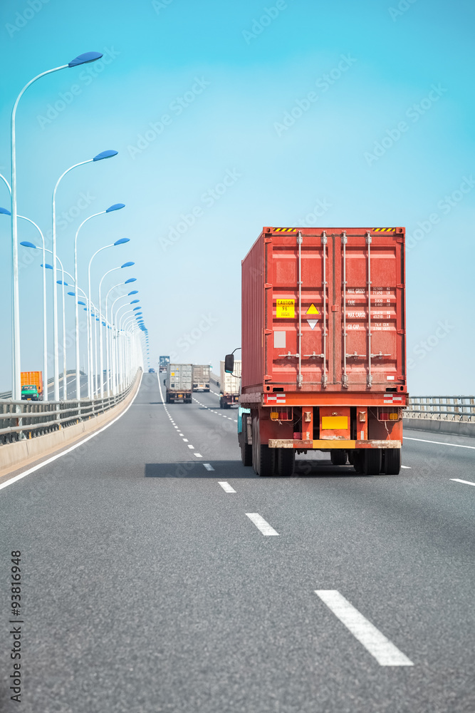 Poster container truck on the bridge