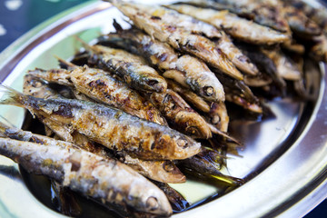 Grilled fishes on the plate