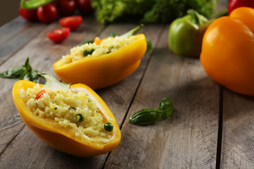 Stuffed peppers with vegetables on table close up