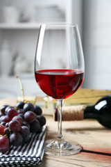 Still life of wine and bread on light background
