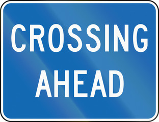 An Canadian warning traffic sign - Crossing ahead, old version. This sign is used in Ontario