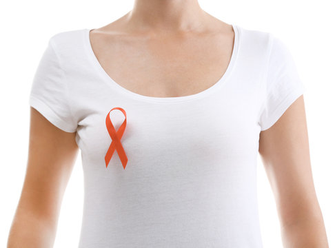 Woman with aids awareness red ribbon isolated on white