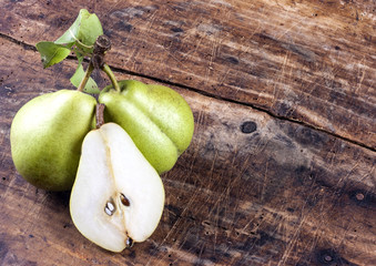 Pear on wooden desk