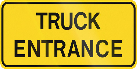 Warning road sign in Canada - Truck entrance. This sign is used in Ontario