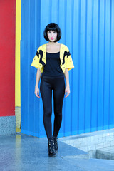 Young woman outside the building