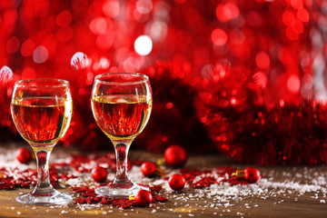 Champagne and Christmas decoration on wooden table