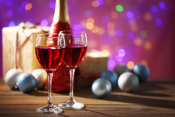 Wine and Christmas decoration on bright background