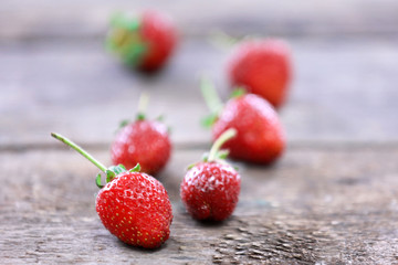 Sweet strawberry on wooden background