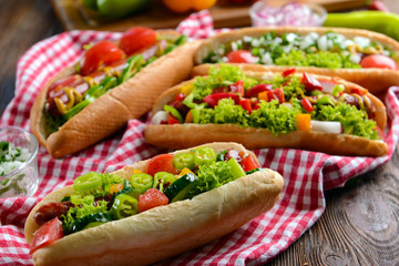 Hot dogs and vegetables on napkin closeup
