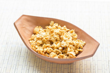 pop corn in clay baking dish