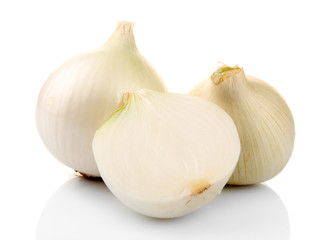 Whole and cut onions isolated on white
