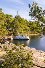 At anchor at one of the small rocky island in the Stockholm arch