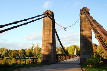 View of the suspension bridge in the autumn evening