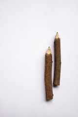 Wooden pencil on white background