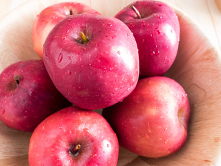 fresh red wet apples with water drops
